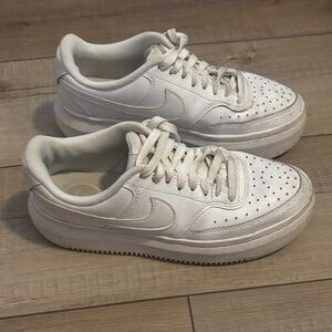 Nike White Platform Sneakers with Elevated Sole